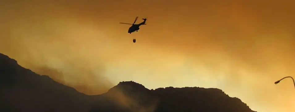 Helicopter putting out a fire fire