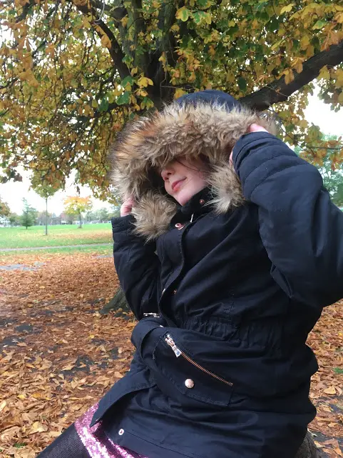 Girl under an autumn tree sensory story