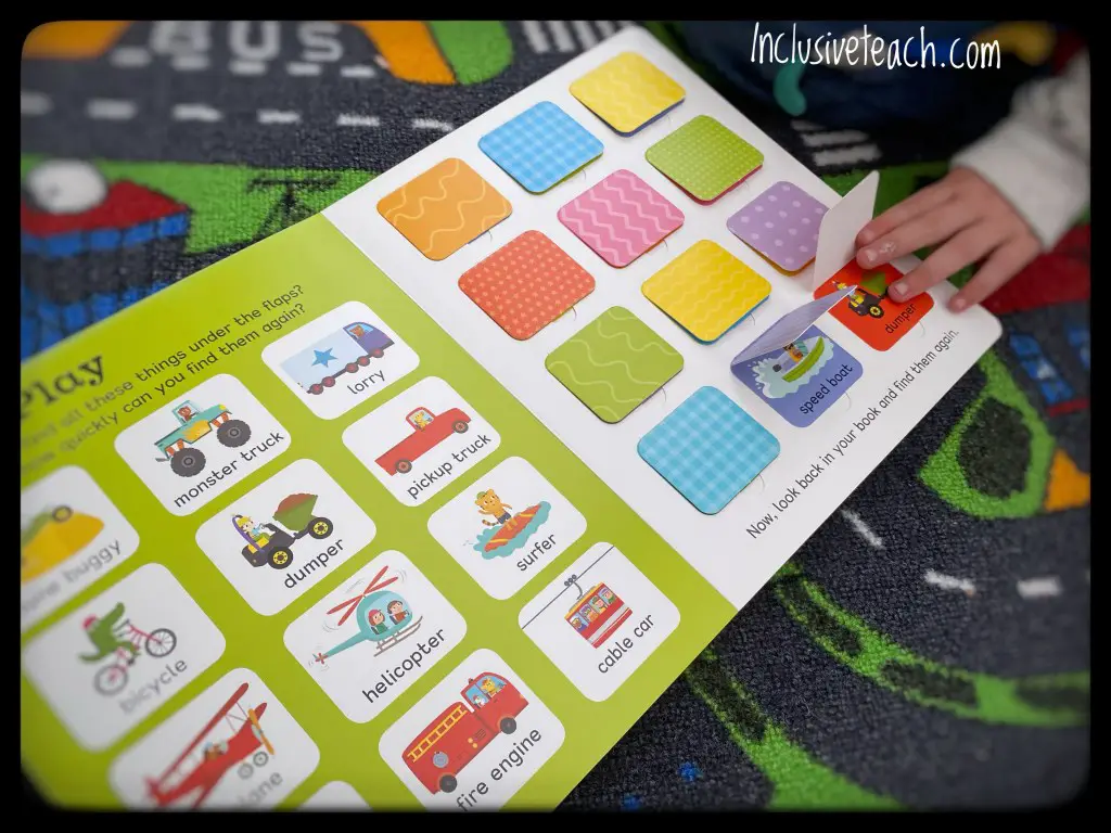 Lift the flap children’s vehicle book for eyfs. Child’s hand opening flap 