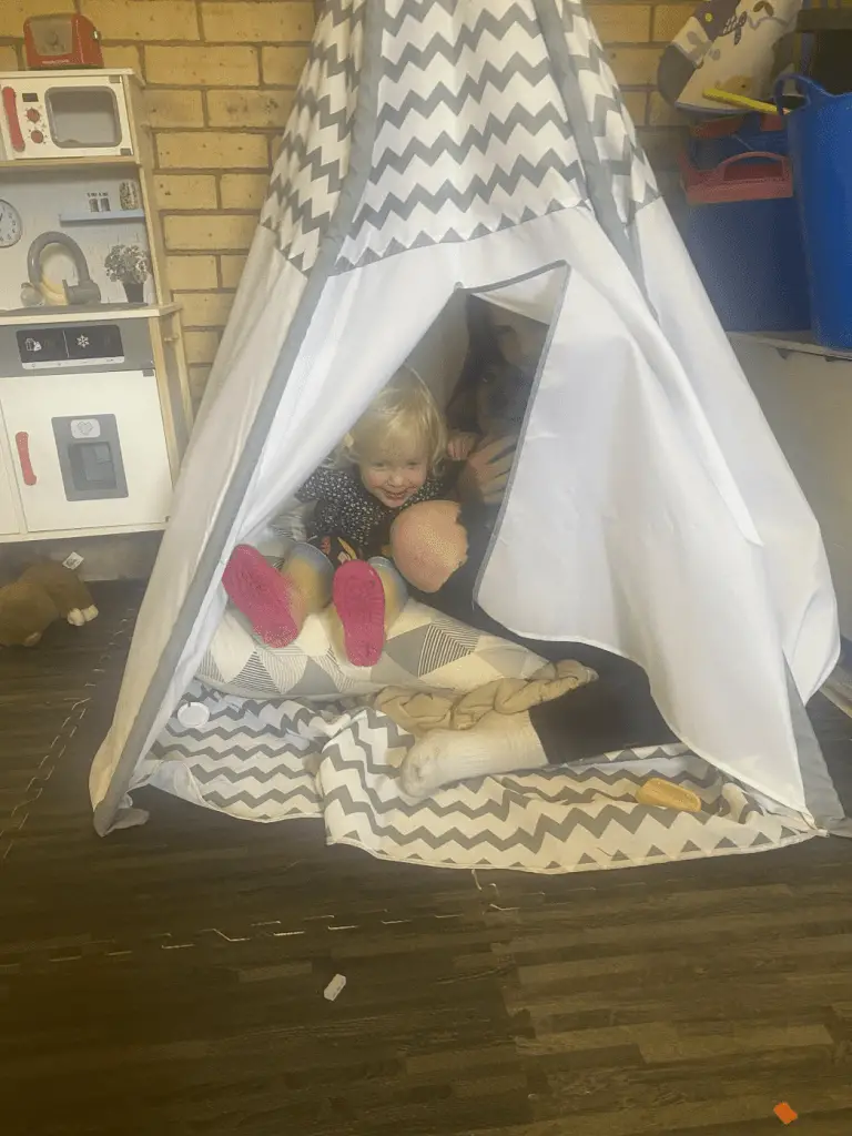 Learning and Play - Children in a play tent. EYFS