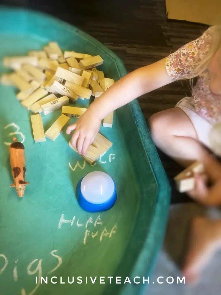 Three Little Pigs: EYFS Activity in a green tuff tray